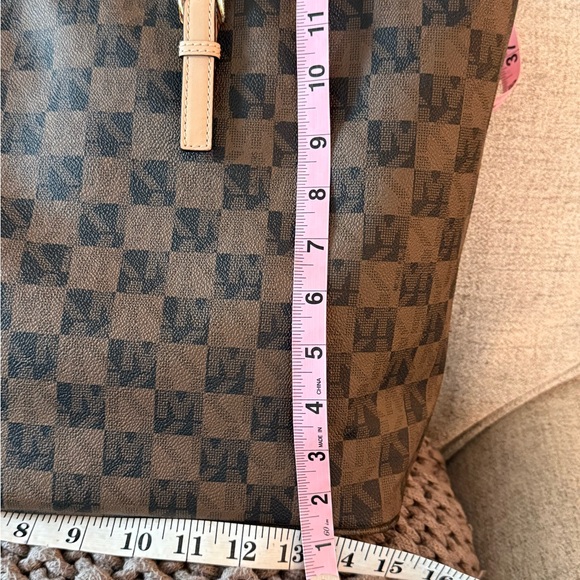 MICHAEL Michael Kors Jet Set travel tote in a brown checkered monogram pattern. - Picture 7 of 7